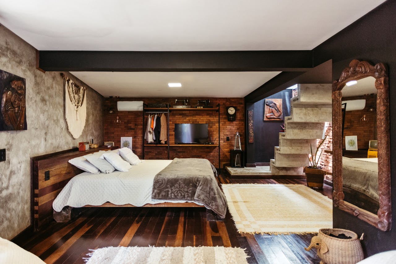 hero-img-01 Cozy rustic modern bedroom with unique decor in Santa Teresa, Brazil.